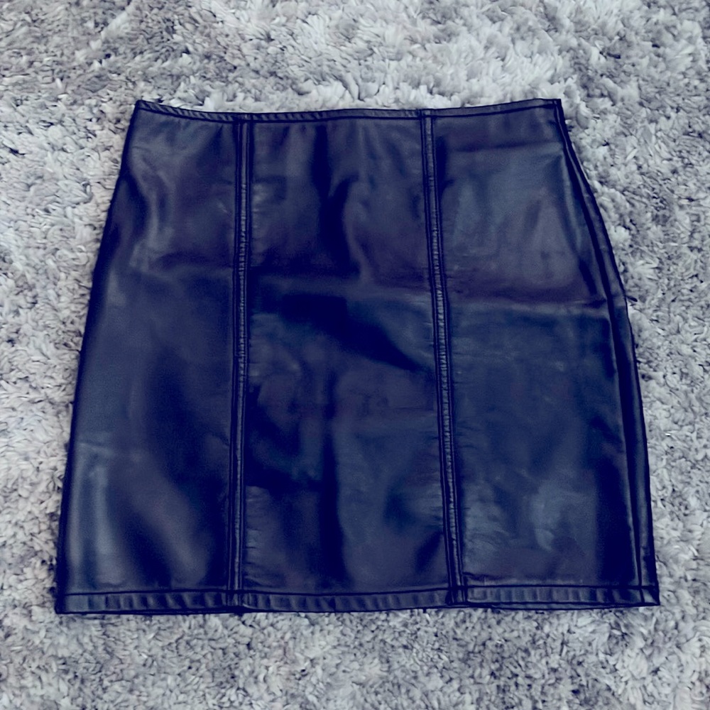 Tight, black leather skirt
